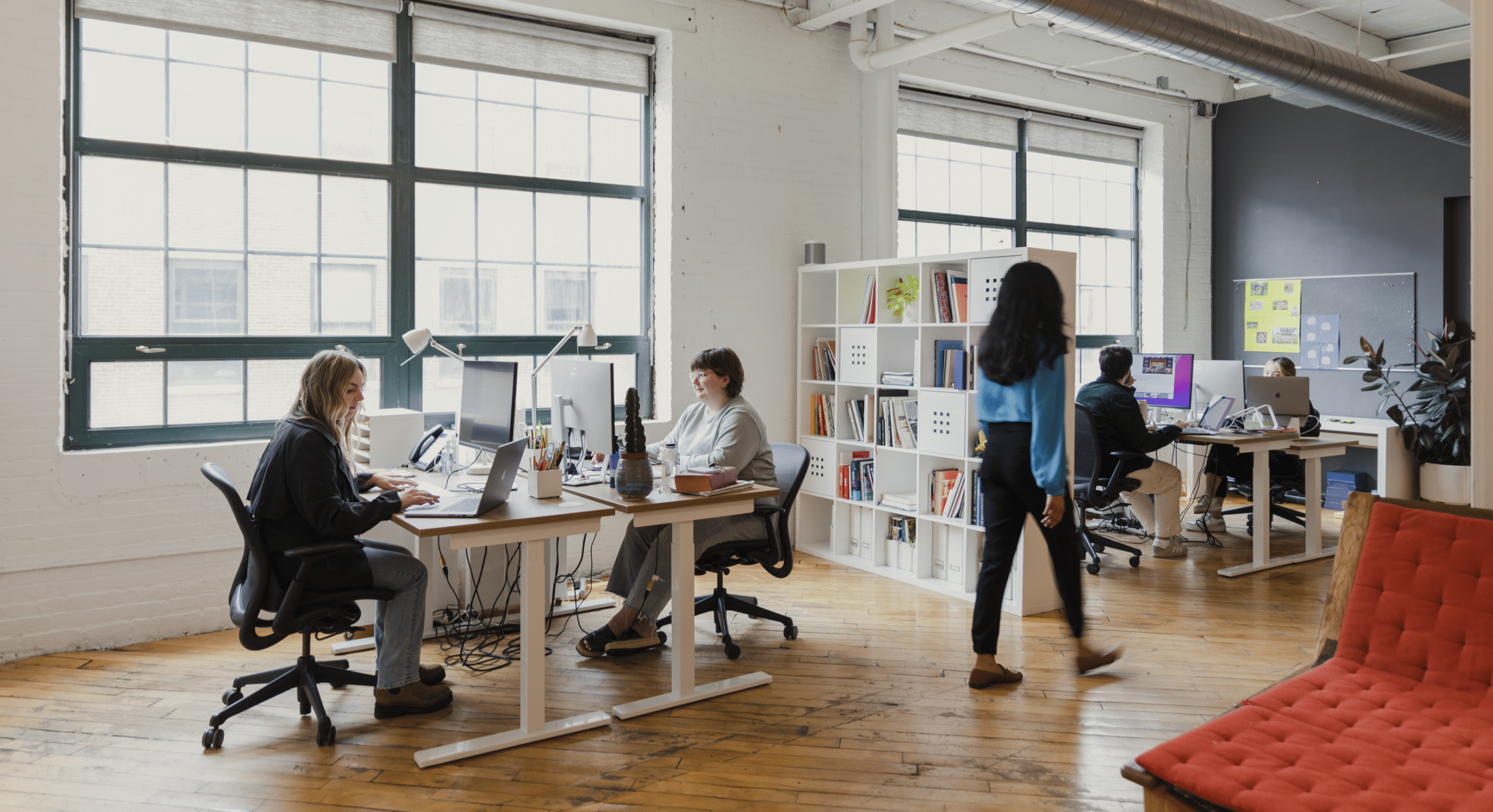 Designers at their desks in the Moth Design studio